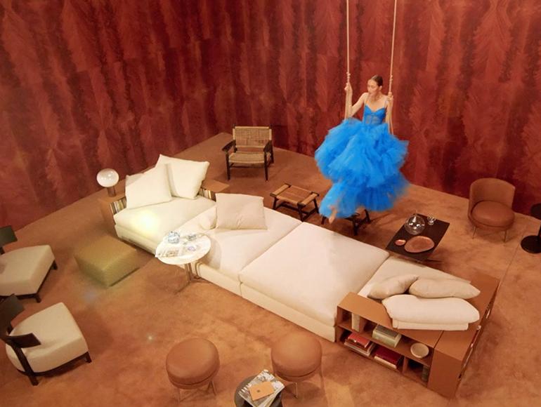 Anna Cleveland goes on the swing above the Groundpice sofa