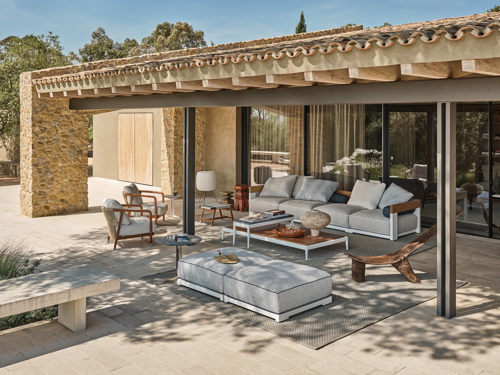 Flexform Outdoor ambience with sofas, armchairs and coffee tables