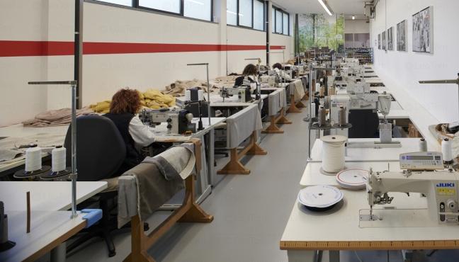 The seamstresses at work in the Meda factory (Italy)